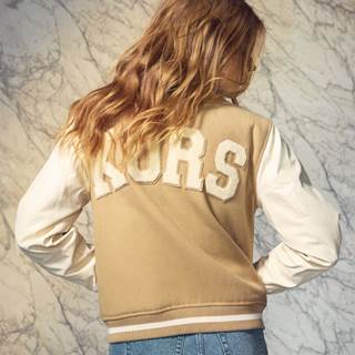 Receive 15% off your purchase of $200 or more with a valid student ID and receive a gift with your purchase of the KORS Varsity capsule.*





